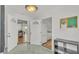 Inviting foyer with views to the updated kitchen and living spaces with tons of natural light at 900 Lake Jessie Dr, Winter Haven, FL 33881