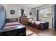 Bedroom featuring dual beds and custom wall decor at 1003 Bear Lake Rd, Apopka, FL 32703