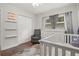 This bedroom offers ample closet space, a chair for relaxing, and themed decor at 1003 Bear Lake Rd, Apopka, FL 32703
