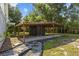 The back yard features a carport to protect your vehicles from the weather at 1003 Bear Lake Rd, Apopka, FL 32703