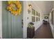 Welcoming front porch with a charming wreath and seasonal decor at 1003 Bear Lake Rd, Apopka, FL 32703