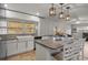 Kitchen with island, breakfast bar, and an open concept layout at 1003 Bear Lake Rd, Apopka, FL 32703
