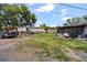 Large backyard with ample space and a screened in patio at 105 Leslie Ave, Winter Haven, FL 33880