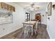 Bright dining area features a ceiling fan and a view of the backyard at 105 Leslie Ave, Winter Haven, FL 33880