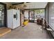 Enclosed patio offers a relaxing space with ample room for storage and decor at 105 Leslie Ave, Winter Haven, FL 33880