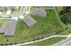 Aerial view showing a home's large backyard, neighboring houses, and the surrounding neighborhood at 1050 Michelangelo Ln, Winter Haven, FL 33884