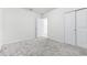 Empty bedroom featuring carpet and natural light at 1050 Michelangelo Ln, Winter Haven, FL 33884