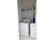 Functional laundry room with a washer and dryer at 1050 Michelangelo Ln, Winter Haven, FL 33884