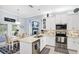 Beautiful kitchen featuring granite countertops, stainless steel appliances, with breakfast table and chairs at 109 Lake Mariam Way, Winter Haven, FL 33884