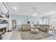 Spacious living room featuring a fireplace and view to the bedroom at 109 Lake Mariam Way, Winter Haven, FL 33884