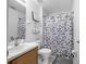 Clean bathroom with a shower, vanity, and well-organized amenities at 110 Minniehaha Cir, Haines City, FL 33844