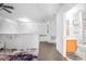 Hallway that leads to a bathroom and bonus room, adding convenience and functionality to the home at 110 Minniehaha Cir, Haines City, FL 33844