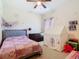 Cozy bedroom with a playful tent, comfortable bed, and colorful decorations at 123 Evergreen Dr, Auburndale, FL 33823