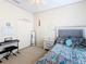 Bright bedroom featuring modern decor, including a plush bed and ample natural light at 123 Evergreen Dr, Auburndale, FL 33823