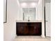 Bathroom featuring double sinks and a stylish vanity with plenty of counter space at 1363 Benevento Dr, Winter Haven, FL 33884