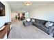 Open-concept living room with modern furnishings and plenty of natural light at 1363 Benevento Dr, Winter Haven, FL 33884