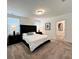 Serene main bedroom with neutral colors and ample natural light at 1363 Benevento Dr, Winter Haven, FL 33884