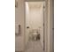 Neutral bathroom with modern fixtures and tiled floor at 1378 Fox Squirrel Dr, Davenport, FL 33897
