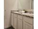Bathroom vanity featuring double sinks and ample counter space at 1378 Fox Squirrel Dr, Davenport, FL 33897