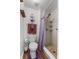 Cozy bathroom with shower, decorative towels, and wood-look flooring at 1800 Emily Dr, Winter Haven, FL 33884