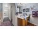 Spacious bathroom with dual vanities, arched entryways, and stylish decor at 1800 Emily Dr, Winter Haven, FL 33884