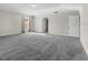Spacious carpeted bedroom with abundant natural light and large closet at 1800 Emily Dr, Winter Haven, FL 33884