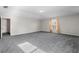 Bright, carpeted bedroom with walk in closet and ample natural light at 1800 Emily Dr, Winter Haven, FL 33884