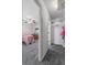 Walk-in closet located between bedroom and bathroom at 1800 Emily Dr, Winter Haven, FL 33884