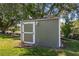 Backyard shed with a single door, offering outdoor storage at 1800 Emily Dr, Winter Haven, FL 33884