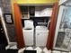 Functional laundry room with washer, dryer, and storage cabinets at 195 E Vine St, Bartow, FL 33830