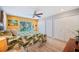 Bedroom features a ceiling fan, closet space, and a sliding glass door for natural light at 2202 Starboard, Winter Haven, FL 33881