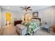 A nicely decorated bedroom with a woven headboard and wood floors at 2202 Starboard, Winter Haven, FL 33881