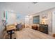 Bonus room with bright light, multiple workstations, and vinyl plank flooring at 2202 Starboard, Winter Haven, FL 33881