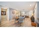 Open living room, dining area, and unique wall decor create a spacious environment at 2202 Starboard, Winter Haven, FL 33881