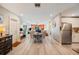 This open floor plan blends kitchen, dining, and living areas for modern living at 2202 Starboard, Winter Haven, FL 33881