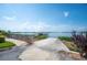 Picturesque waterfront view featuring a private dock and boat house on a serene lake at 2202 Starboard, Winter Haven, FL 33881