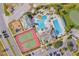 Aerial view of the pool, clubhouse, tennis court, and playground in the Providence community at 2340 Pinehurst Ct, Davenport, FL 33837