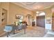 Elegant foyer featuring dark wood doors, tile flooring, and an open layout at 2340 Pinehurst Ct, Davenport, FL 33837