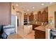 This kitchen features beautiful granite counters, stainless steel appliances, and ample cabinet space at 2340 Pinehurst Ct, Davenport, FL 33837