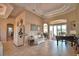Bright and airy living room with tile floors, recessed lighting and neutral tones at 2340 Pinehurst Ct, Davenport, FL 33837