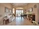 Spacious living room with tile floors, bright light and comfortable seating at 2340 Pinehurst Ct, Davenport, FL 33837