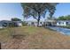 Charming single-story home with a well-maintained lawn and covered parking at 2409 E Civitan Ave, Lakeland, FL 33801
