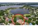 Waterfront property with private pool and dock access on a lush lake, perfect for serene living at 255 Lake Link Rd, Winter Haven, FL 33884
