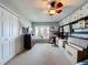 Bedroom with a dresser, shelves and exercise equipment at 255 Lake Link Rd, Winter Haven, FL 33884