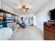 Bedroom with a closet and shelves full of boxes and an exercise bike at 255 Lake Link Rd, Winter Haven, FL 33884