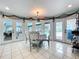 Cozy breakfast nook with pool views, adorned with coastal decor and bright, natural light at 255 Lake Link Rd, Winter Haven, FL 33884