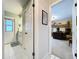 Hallway showing doorway to office space and doorway to bathroom at 255 Lake Link Rd, Winter Haven, FL 33884