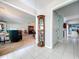 Hallway with tile flooring leading from the living room to other areas of the house at 255 Lake Link Rd, Winter Haven, FL 33884