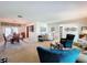 Open-concept living room and dining room with comfortable seating and natural light at 255 Lake Link Rd, Winter Haven, FL 33884