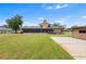 Expansive backyard with a screened porch at 2731 State Road 557, Lake Alfred, FL 33850